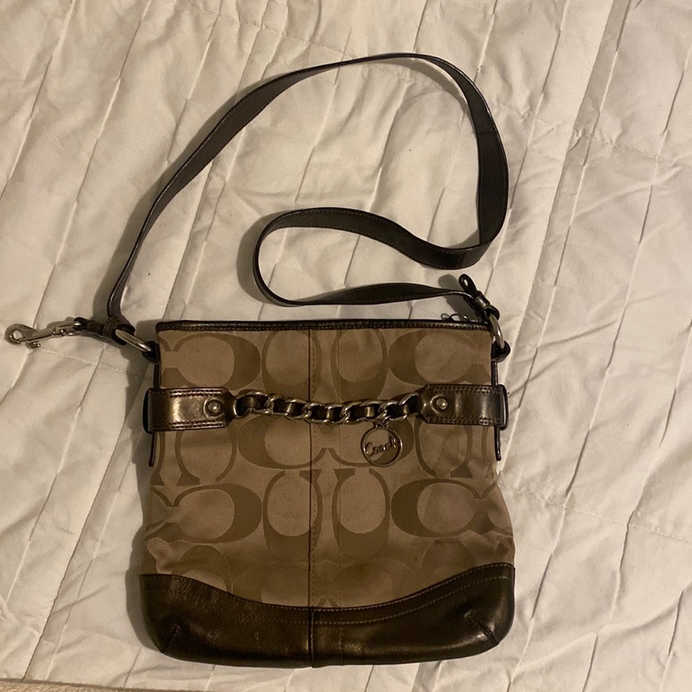 Adjustable strap brown coach bag